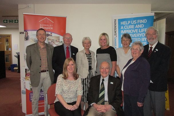 Group photo of Julie Ferry and team with Parkinson's UK team.