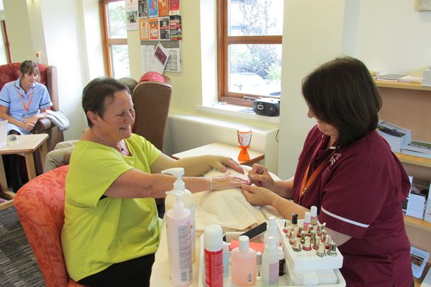 patient having her nails done