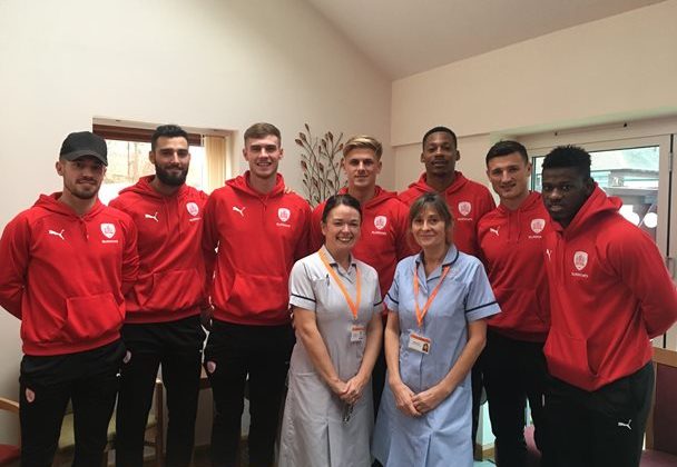 Barnsley FC players with Hospice staff