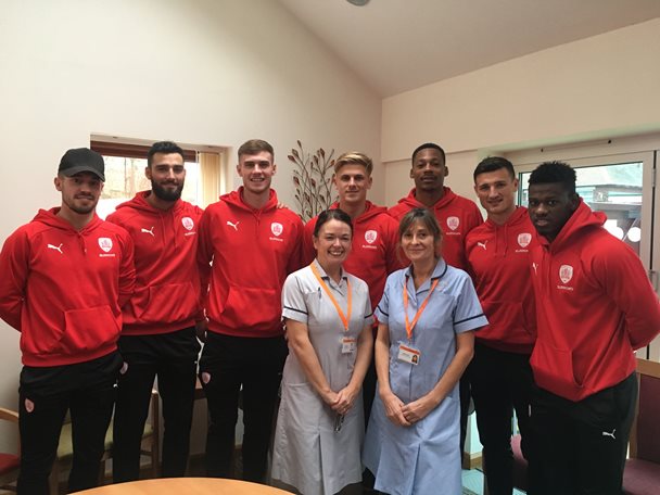 Barnsley FC players with Hospice staff