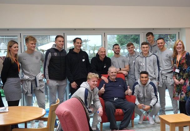 Photo of the Barnsley Football team as they visit the patients and staff at Barnsley Hospice