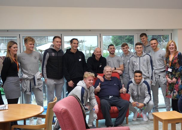 Photo of the Barnsley Football team as they visit the patients and staff at Barnsley Hospice
