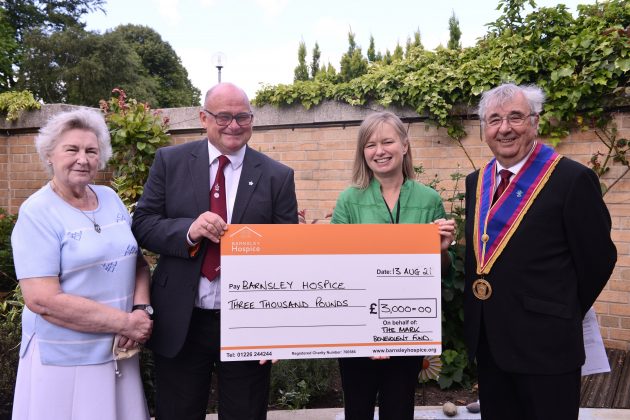 Hospice volunteer Jean Thompson-Banks, Freemason John Sealey, hospice fundraising officer Janet O'Hara and Freemason James Stanley