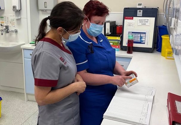 Photo of two of the medical team reviewing some medication at Barnsley Hospice