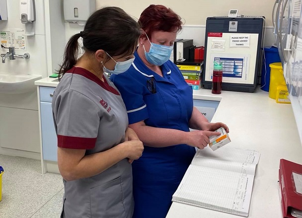 Photo of two of the medical team reviewing some medication at Barnsley Hospice