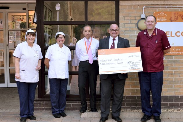 John Sealey with hospice staff Sue Parton and Sarah Parkinson, Ian Muffett and Chris Black.