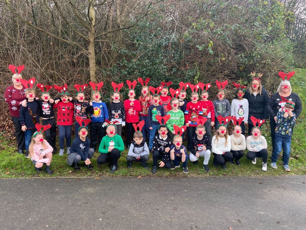 pupils take part in our Rudolf Run for  the charity
