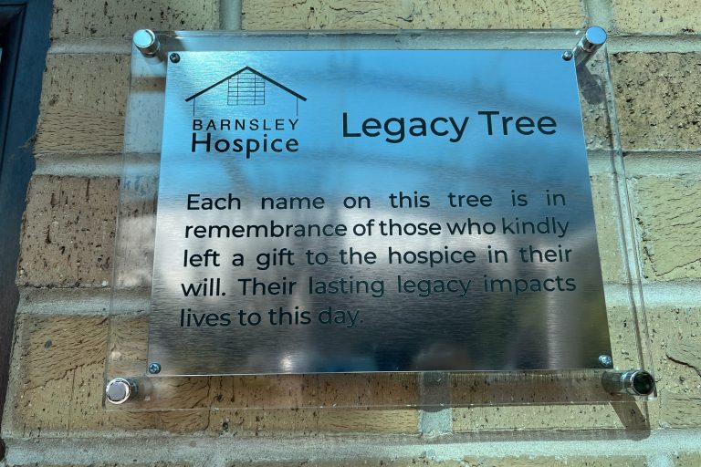 The Legacy Tree plaque. It reads 