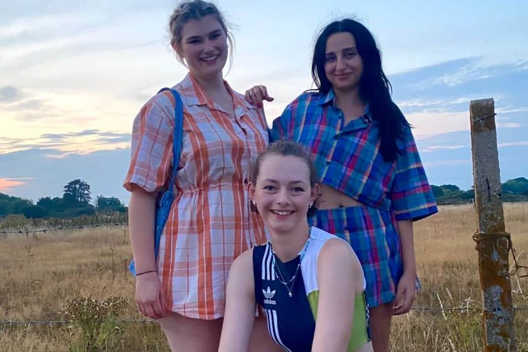 Harriet with two young women wearing outfits transformed fro Retail Hub
