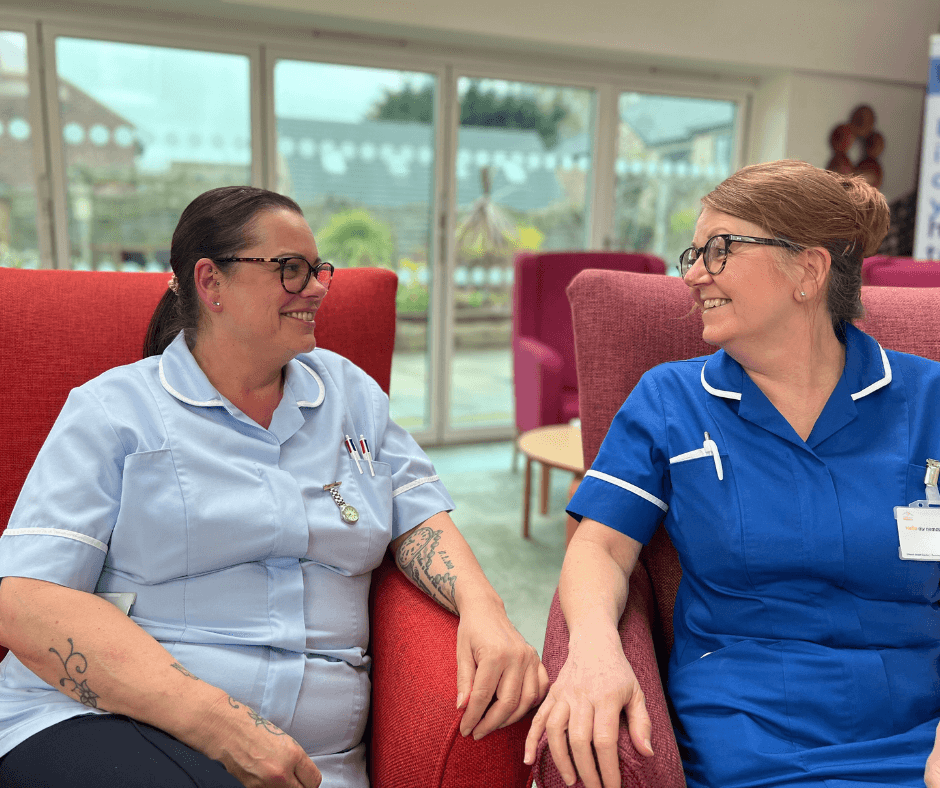 Photo of two nurses smiling