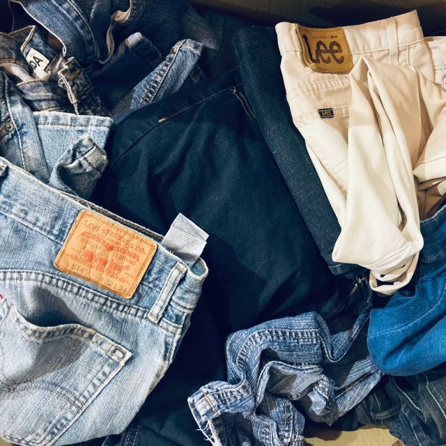 pile of denim jeans