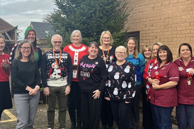 Staff attending the Christmas Coffee Morning